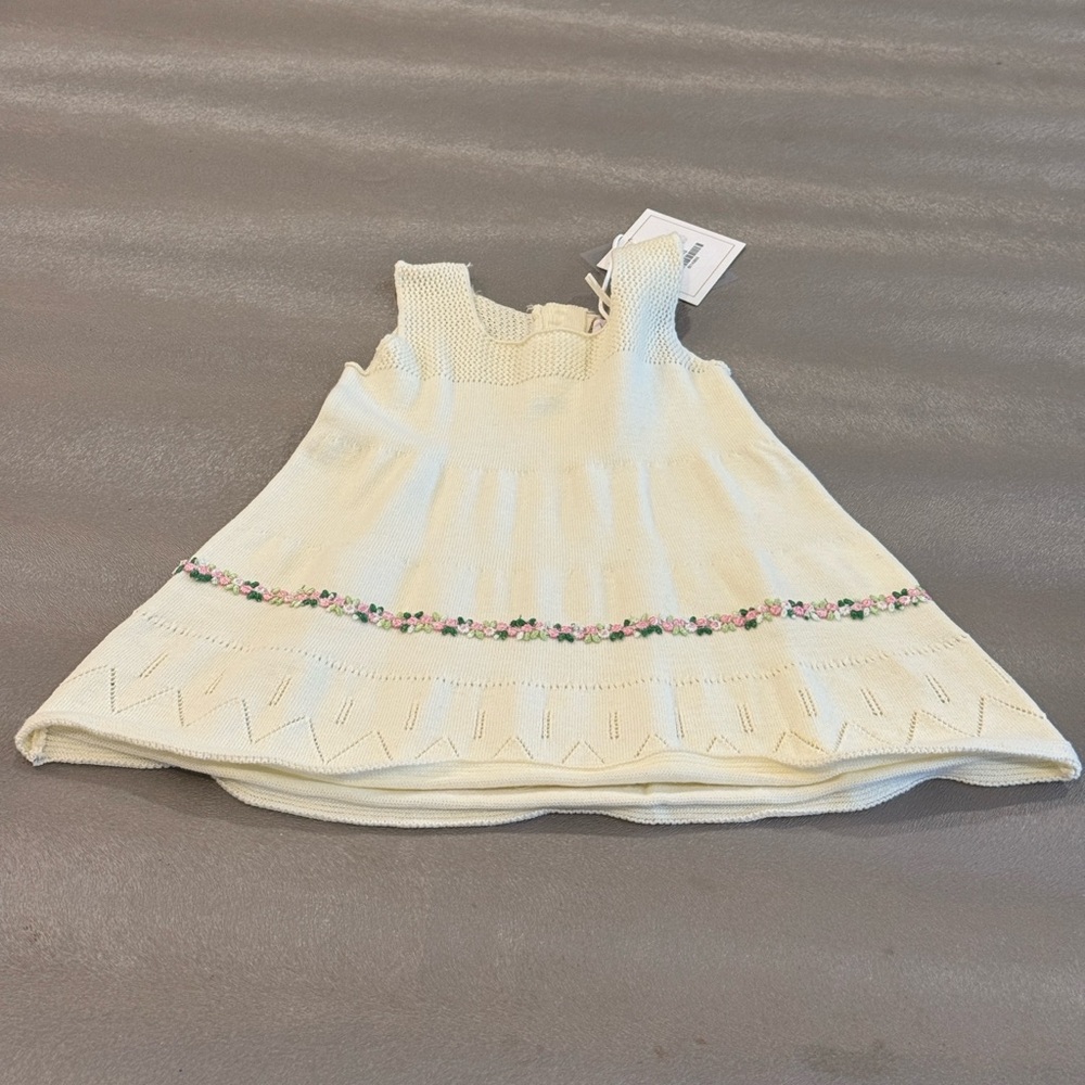 Charming Cream Kids Dress with Floral Accents.